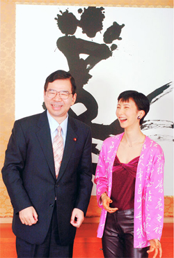 写真：松井さんと志位さん